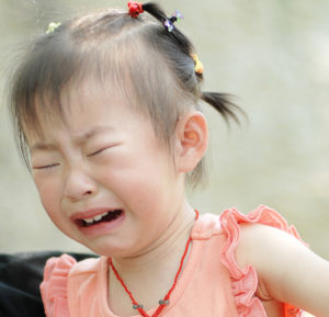 Little girl crying - Reactive Attachment Disorder (RAD)