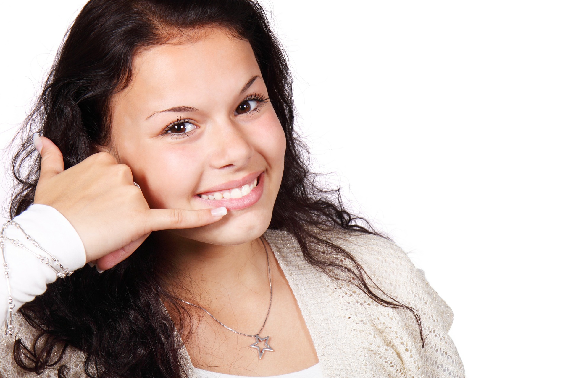 Girl making a phone gesture with her hand
