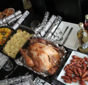 holiday table with turkey and decorations
